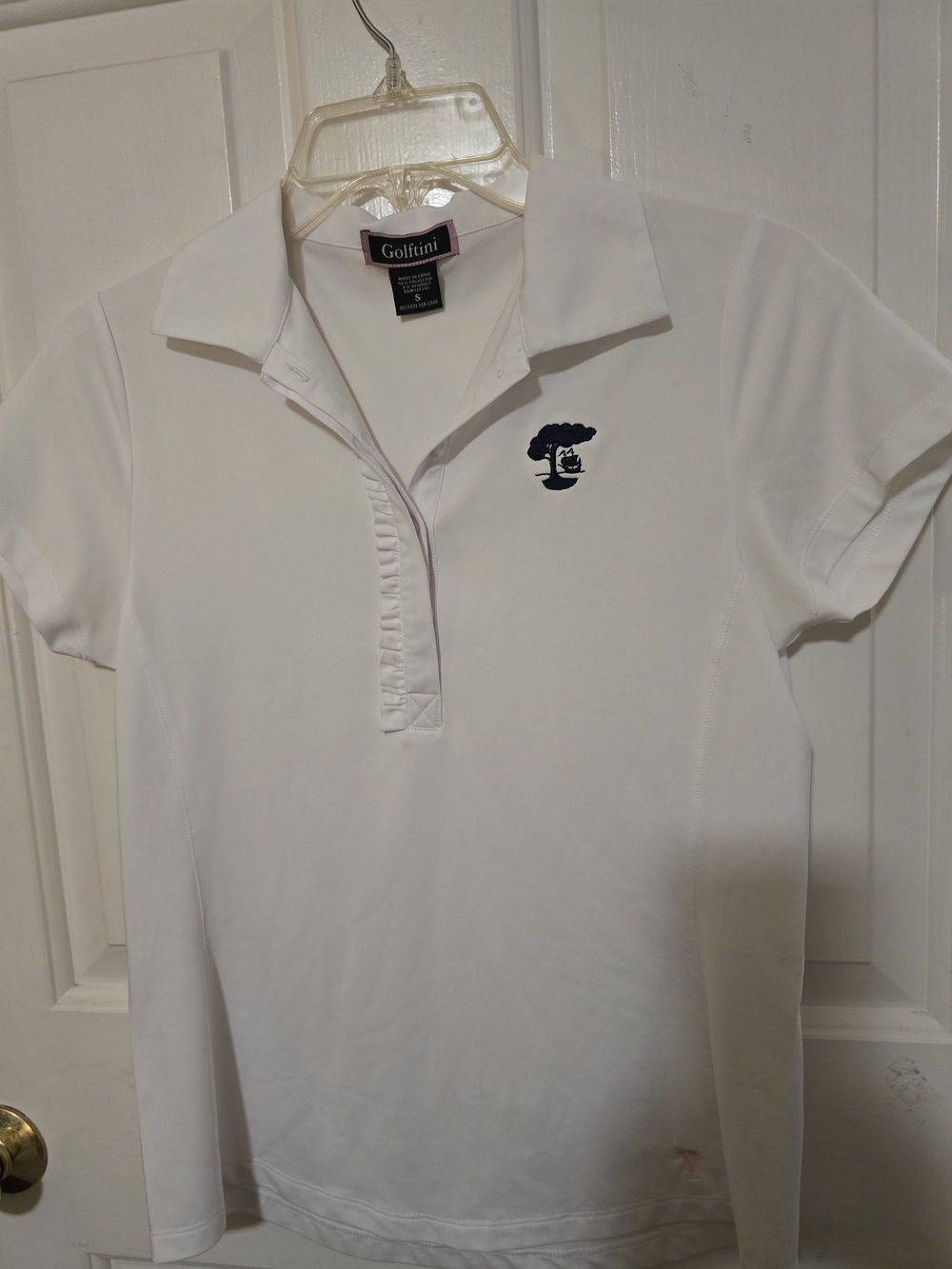 Golftini Women's White Polo Top with Navy Logo